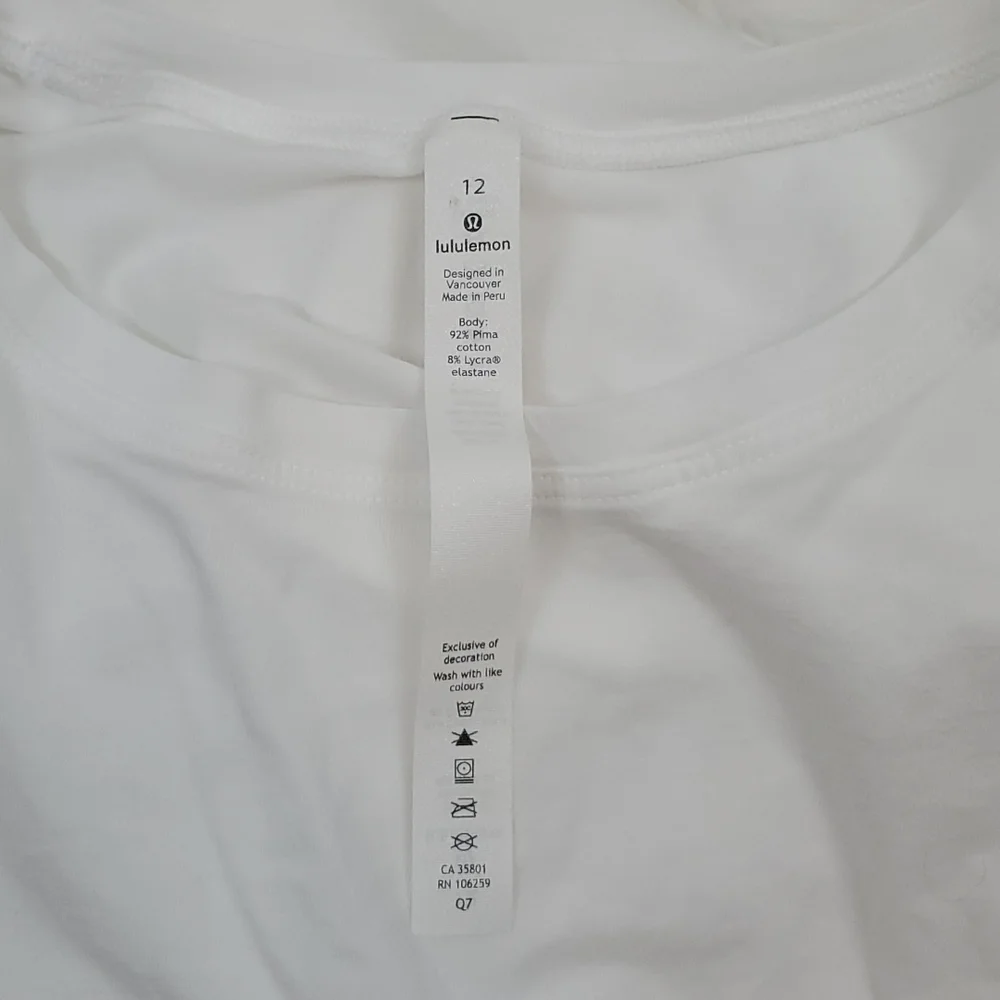 Lululemon Athletica white top women size 12